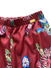 Detalle de cintura elasticada y placa Bad Sisters del pijama Geisha Rojo